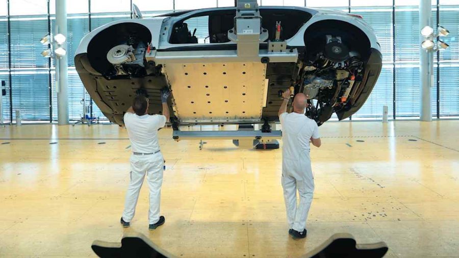 German Automakers Face Historic Job Cuts Amidst Surge of Chinese Competitors